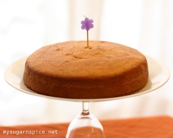 Southern (Manhattan) Coconut Cake decorated with a candle